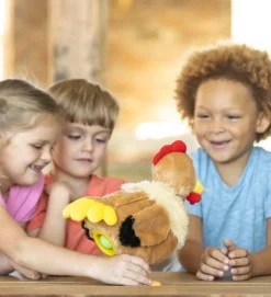 HearthSong Plush Musical Egg-Laying Hen With Three Eggs